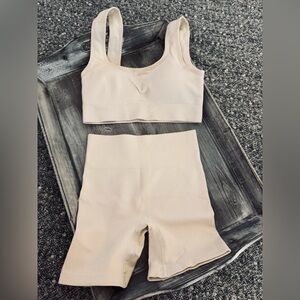 Cream ribbed two-piece set, padded sports bra, high-waisted biker shorts